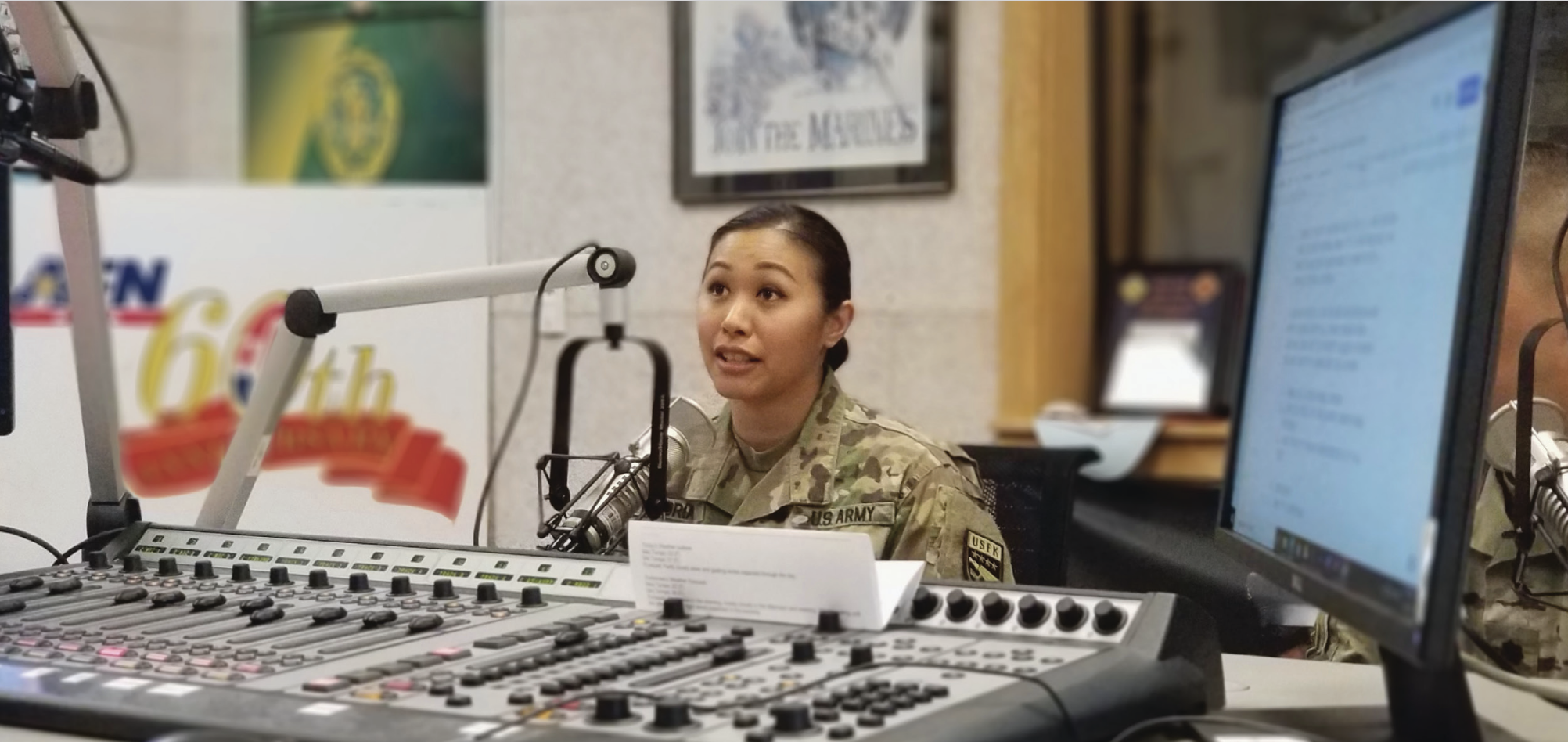 Major Karen Deloria, Japanese–language trained foreign area officer assigned to U.S. Forces Korea, talks live on air on American Forces Networkabout Army foreign area officer opportunities, Camp Humphreys, South Korea, January 25, 2023 (U.S. Army/Patrick Bray)